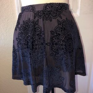 Navy blue skater skirt with velvet details